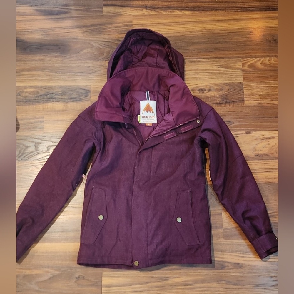 Burgundy women's Burton winter coat.
